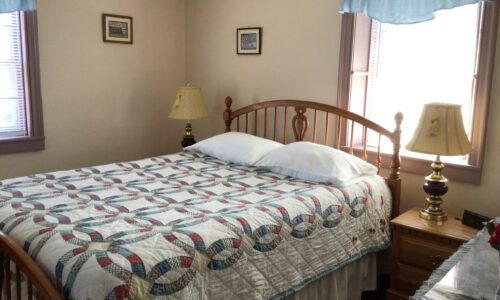 photo of queen bed in Dutchman Suite at Blue Rock Bed and Breakfast