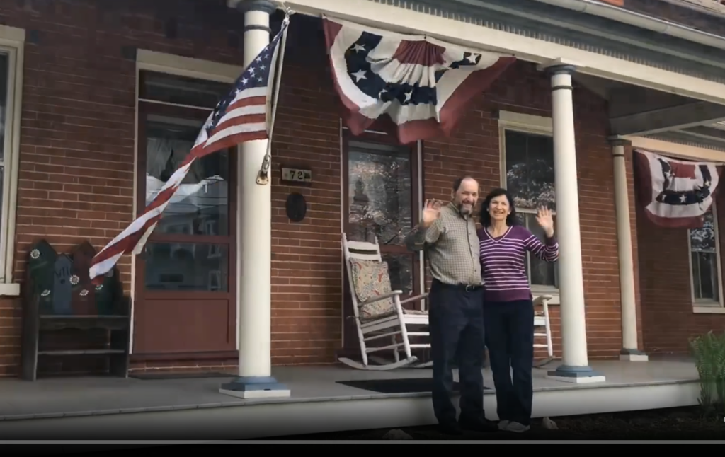 photo of hosts Ed & Stephanie Hersh on front porch of Blue Rock Bed and Breakfast