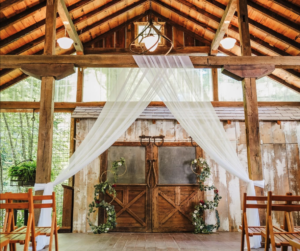 image of an interior shot of a setup of a wedding location in a barn
